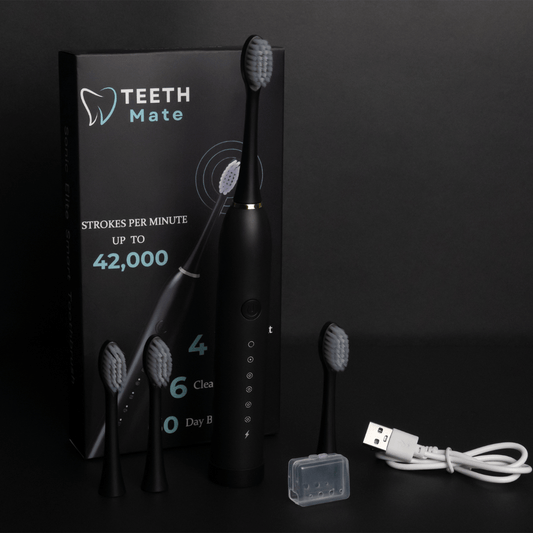 Electric toothbrush kit with packaging, brush heads, and travel cap